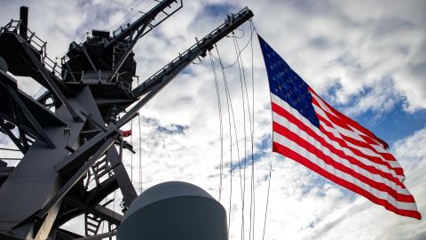 The Arleigh Burke-class guided-missile destroyer USS Ramage (DDG 61) flies the battle ensign during a formation transit as part of the Gerald R. Ford Carrier Strike Group, Oct. 25, 2022. The first-in-class aircraft carrier USS Gerald R. Ford (CVN 78) is on its inaugural deployment conducting training and operations alongside NATO Allies and partners to enhance integration for future operations and demonstrate the U.S. Navy’s commitment to a peaceful, stable and conflict free Atlantic region. (U.S. Navy phot