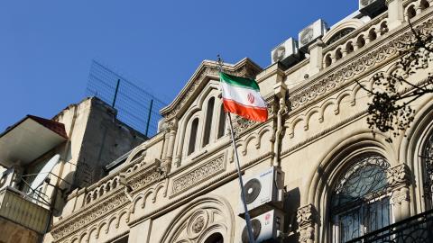 BAKU, AZERBAIJAN - JANUARY 27: The Iranian flag flies outside the country's embassy on January 27, 2023 in Baku, Azerbaijan. According to Azerbaijan's Foreign Ministry a man armed with a Kalashnikov-style rifle attacked the Azerbaijan Embassy in Iran's capital Tehran, an employee of the security service of the embassy was killed, and two more were injured. (Photo by Aziz Karimov/Getty Images)