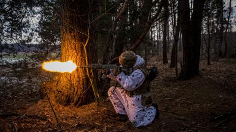 A Ukrainian serviceman fires during a joint military training of armed forces, national guards, border guards and Security Service of Ukraine in Rivne region, near the border with Belarus, on February 11, 2023, amid the Russian invasion of Ukraine. (Photo by Dimitar DILKOFF / AFP) (Photo by DIMITAR DILKOFF/AFP via Getty Images)