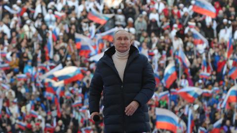 Russian President Vladimir Putin attends a concert marking the eighth anniversary of Russia's annexation of Crimea at the Luzhniki stadium in Moscow on March 18, 2022. (Getty Images)