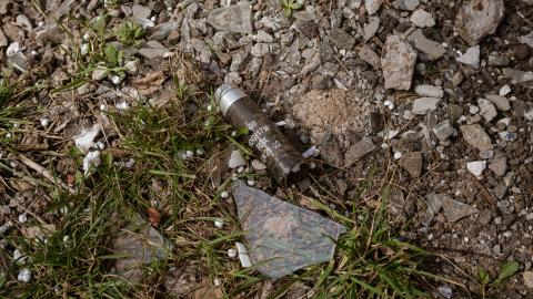 A cluster bomb capsule on the ground amid Russia-Ukraine War at the frontline city of Avdiivka, Ukraine, on March 23, 2023. (Andre Luis Alves via Getty Images)