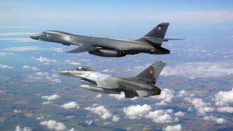 A Romanian F-16 escorts a B1B Lancer during a training mission for Bomber Task Force Europe on May 29, 2020. (Romanian Air Force photo)