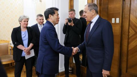 Russian Foreign Minister Sergei Lavrov welcomes the Special Representative of the Chinese Government on Eurasian Affairs Li Hui at the Russian Foreign Ministry headquarters in Moscow, Russia, on May 26, 2023. (Photo by Russian Foreign Ministry/Handout/Anadolu Agency via Getty Images)