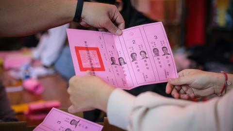 Election workers count ballots on January 13, 2024, in Taipei, Taiwan. (Photo by Annabelle Chih/Getty Images)