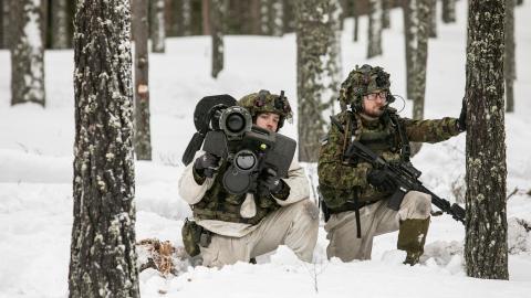 Members of the Estonian army train on February 8, 2022, in Lasna, Estonia. (Photo by Paulius Peleckis/Getty Images)