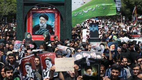 Mourners attend the funeral of Iran's President in Tehran on May 22, 2024. (Atta Kenare/AFP via Getty Images)