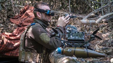 A Ukrainian soldier pilots a drone in search of targets in Kharkiv, Ukraine, on June 18, 2024. (Pablo Miranzo/Anadolu via Getty Images)