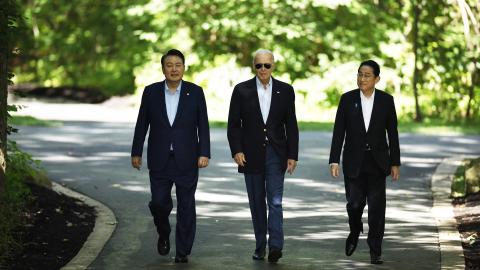 South Korean President Yoon Suk Yeol, United States President Joe Biden, and Japanese Prime Minister Kishida Fumio arrive for a joint news conference on August 18, 2023, in Camp David, Maryland. (Chip Somodevilla via Getty Images)