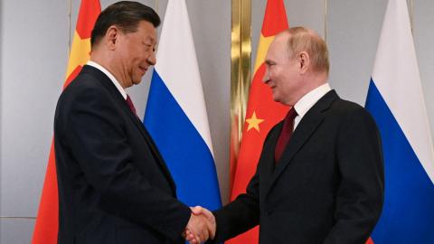 Russian President Vladimir Putin meets with Chinese President Xi Jinping on the sidelines of the Shanghai Cooperation Organisation (SCO) member states leaders' summit in Astana, Kazakhstan, on July 3, 2024. (Photo by Sergei Guneyev/POOL/AFP via Getty Images)