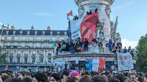 People celebrate the victory of the left-wing union after the French parliamentary elections in Paris, France, on July 7, 2024. (Luc Auffret/Anadolu via Getty Images)