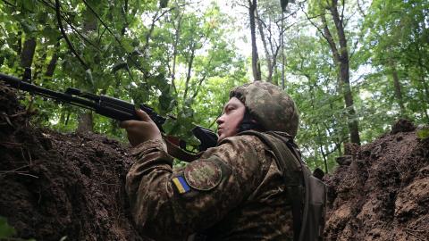 A serviceman of Ukraine's National Guard in a trench during a tactical exercise on July 22, 2024. (Vyacheslav Madiyevskyy/Ukrinform/Future Publishing via Getty Images)