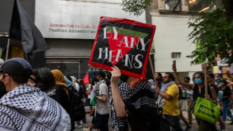 Supporters of Palestine march outside of CUNY Grad Center on July 22, 2024 in New York City. Demonstrators in support of Palestine have been critical of the city university's investments in Israel among other issues. The protest comes only days ahead of Israeli Prime Minister Benjamin Netanyahu's address to Congress. (Photo by Spencer Platt/Getty Images)