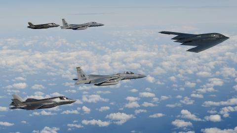 A B-2A Spirit bomber assigned to the 509th Bomb Wing leads a delta formation consisting of  two F-15C Eagles assigned to the 48th Fighter Wing and two Royal Air Force F-35B Lightnings as they  conduct aerial operations over the North Sea on September 16, 2019. (US Air Force)