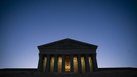 The US Supreme Court building illuminated against a blue sky in Washington, DC. (Bloomberg via Getty Images)