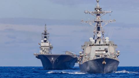 The Arleigh Burke-class guided-missile destroyer USS Rafael Peralta (DDG 115) and the Japan Maritime Self-Defense Force first-in-class helicopter destroyer JS Izumo (DDH 183) are seen from the Ticonderoga-class guided-missile cruiser USS Robert Smalls (CG 62) while operating in the Philippine Sea in support of Valiant Shield 2024, June 7, 2024. (DVIDS)