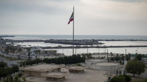 An Iranian flag waves on a beach in Bushehr, Iran, home to Iran's first nuclear seaport, on April 28, 2024. (Morteza Nikoubazl/NurPhoto via Getty Images)