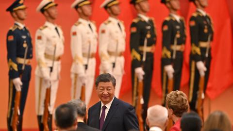 China's President Xi Jinping walks after delivering a speech in Beijing on September 29, 2024. (Adek Berry/AFP via Getty Images)