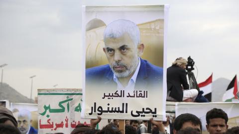 Yemen's Houthi followers hold placards depicting the Hamas leader Yahya Sinwar on August 9, 2024, in Sana'a, Yemen. (Mohammed Hamoud via Getty Images)