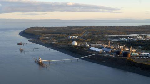 A landscape marked by the oil and gas industry, September 27, 2008, at Nikiski Beach and Cook Inlet in Kenai, Alaska. The region is considered the 'ground zero' for oil and gas in Alaska, one of the top two oil producing states in the country. Lower right is Agrium Nitrogen Operations and left of that is Conoco Phillips LNG (liquefied natural gas) Facility. (Photo by Farah Nosh/Getty Images)