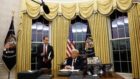 President Donald Trump speaks to reporters after signing a series of executive orders in the White House. (Anna Moneymaker via Getty Images)