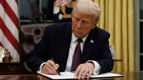 President Donald Trump signs executive orders in the Oval Office of the White House on January 20, 2025. (Anna Moneymaker via Getty Images)