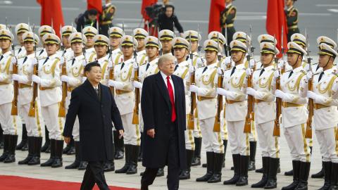 United States President Donald Trump takes part in a welcoming ceremony with Chinese President Xi Jinping on November 9, 2017, in Beijing, China. (Thomas Peter via Getty Images)