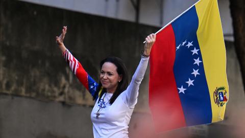 Venezuelan opposition leader Maria Corina Machado waves a national flag during an opposition protest  on January 9, 2025, in Caracas, Venezuela. (Getty Images)