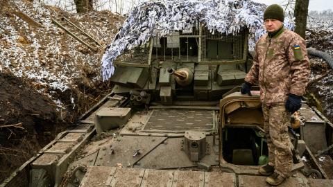 A Ukrainian Army soldier stands on an American Bradley Fighting Vehicle on January 15, 2025, in Sumy, Ukraine. (Photo by Scott Peterson/Getty Images)