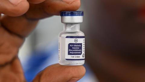 A health worker displays a bottle containing the vaccine against malaria during the launch of a vaccination campaign for children in Abidjan, Côte d’Ivoire, on July 15, 2024. (Sia Kambou via Getty Images)