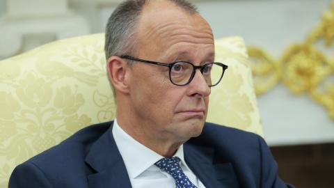 German Chancellor Friedrich Merz listens to a reporter's question during a meeting with US President Donald Trump in the Oval Office on June 05, 2025, in Washington, DC. (Anna Moneymaker via Getty Images)