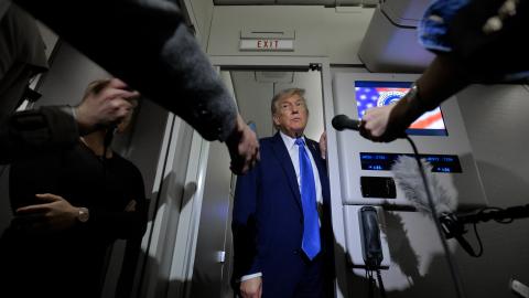 President Donald Trump talks to reporters on board Air Force One after leaving early from the G7 leaders’ summit on June 16, 2025, in Calgary, Alberta, to respond to the conflict between Israel and Iran. (Chip Somodevilla via Getty Images)