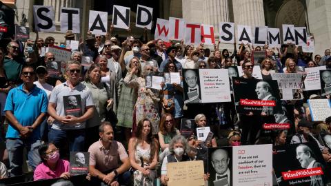 Writers gather to read selected works of author Salman Rushdie to show solidarity for free expression outside the New York Public Library in New York City on August 19, 2022. (Timothy A. Clary/AFP via Getty Images)
