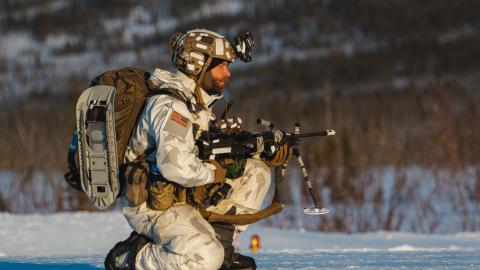 A 10th Special Forces Group Green Beret provides security on the drop zone  March 31, 2023. (U.S. Army photo by Sgt. Luis M. Solorio)