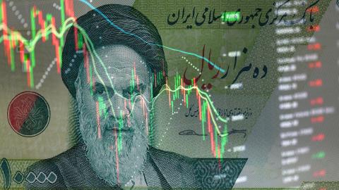 Iranian rials banknote on the background of stock charts. (Anton Petrus via Getty Images)
