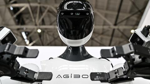 A robot from AgiBot is seen during the Global Developer Conference, organized by the Shanghai AI Industry Association, in Shanghai on February 21, 2025. (Hector Retamal via Getty Images)