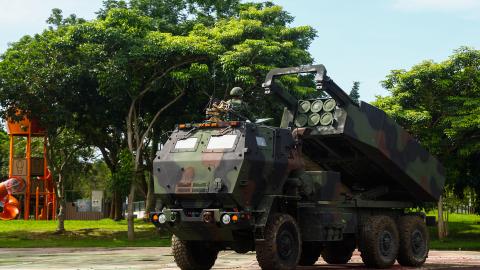 Taiwanese soldiers of the 58th Artillery Command mobilize a HIMARS missile system to a tactical position as part of the ongoing Han Kuang military exercise in Taichung, Taiwan, on July 12, 2025. (Daniel Ceng via Getty Images)