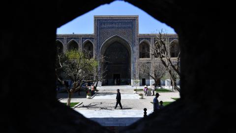 People tour the Registan cultural site in Samarkand, Uzbekistan, on April 3, 2025. (Getty Images)