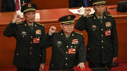 Zhang Youxia, then vice chairman of the Central Military Commission of the People’s Republic of China, stands with members of the commission at the Great Hall of the People in Beijing on March 11, 2023. (Getty Images)