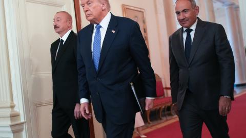 President Donald Trump arrives at a signing ceremony with Azerbaijani President Ilham Aliyev and Armenian Prime Minister Nikol Pashinyan in the State Dining Room of the White House on August 8, 2025. (Getty Images)