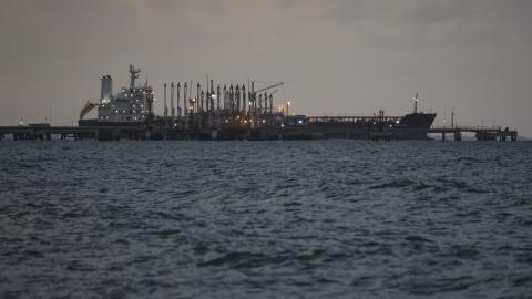 An oil tanker remains anchored at the dock during a walk around the outskirts of the 'El Palito' refinery on December 18, 2025 in Puerto Cabello, Venezuela. President Trump stated on December 17th that Venezuela took away oil rights from the US. Trump's administration has sanctioned Venezuelan oil with blockades, while many US Navy units are deployed off the coast of Venezuela under the premise of combating the drug cartels. (Photo by Jesus Vargas/Getty Images)