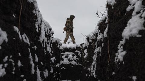 A Ukrainian soldier walks around a snow-covered training ground in Kharkiv Oblast in Ukraine on December 27, 2025. (Getty Images)