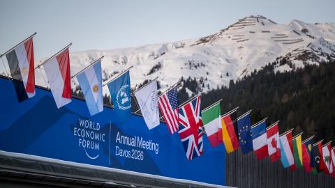  A sign of the World Economic Forum (WEF) is seen on the top of the Congress Centre that hosts the WEF annual meeting in the Alpine resort of Davos on its opening day in Davos on January 19, 2026. The World Economic Forum takes place in Davos from January 19 to January 23, 2026. (Photo by Fabrice COFFRINI / AFP via Getty Image