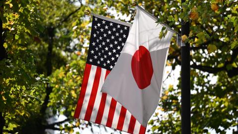 The Japanese and US flags fly outside the Akasaka Palace in Tokyo on October 28, 2025. (Getty Images)