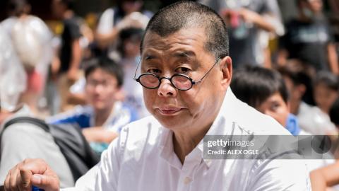 Hong Kong media tycoon and pro-democracy supporter Jimmy Lai attends a rally near the government headquarters in Hong Kong on September 28, 2014. Activists massed outside Hong Kong's government headquarters on September 28, vowing to keep up an increasingly tense civil disobedience campaign unless Beijing grants more political freedoms. AFP PHOTO / ALEX OGLE (Photo by Alex OGLE / AFP) (Photo by ALEX OGLE/AFP via Getty Images)