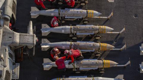 U.S. Sailors prepare to stage ordnance on the flight deck of Nimitz-class aircraft carrier USS Abraham Lincoln (CVN 72) in support of Operation Epic Fury, Feb. 28, 2026. (U.S. Navy photo)