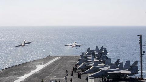 Two F/A-18 Super Hornets launch from the flight deck of Nimitz-class aircraft carrier USS Abraham Lincoln (CVN 72) in support of Operation Epic Fury, March 3, 2026. (U.S. Navy photo)