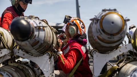 U.S. Sailors, assigned to Strike Fighter Squadron 31, conduct a routine ordnance inspection on the flight deck of the USS Gerald R. Ford (CVN 78), while underway, March 17, 2026. (U.S. Navy photo)