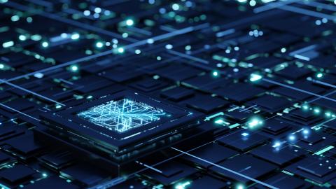 Futuristic central processing unit on the abstract motherboard with blue lights and rays as symbol of data transfers. (Getty Stock Photo) Share to Twitter