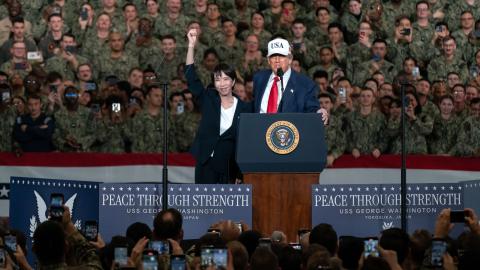 Japanese Prime Minister Sanae Takaichi waves as President Donald Trump speaks aboard USS George Washington on October 28, 2025, in Yokosuka, Japan. (Getty Images)