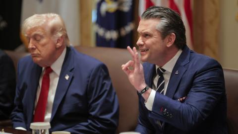 U.S. Secretary of War Pete Hegseth gestures as he speaks during a Cabinet meeting in the Cabinet Room of the White House on March 26, 2026 in Washington, DC. This is Trump's second Cabinet meeting of 2026 and the first since the United States and Israel began attacking Iran on February 28. (Photo by Chip Somodevilla/Getty Images)